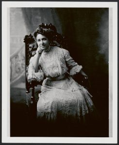 19th-century photograph of a black woman in a white dress